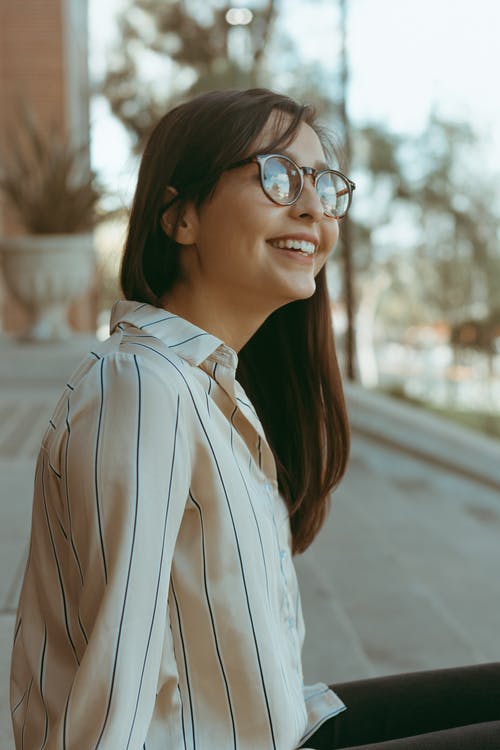 有关咖啡色头发的女人, 垂直拍摄, 女人的免费素材图片