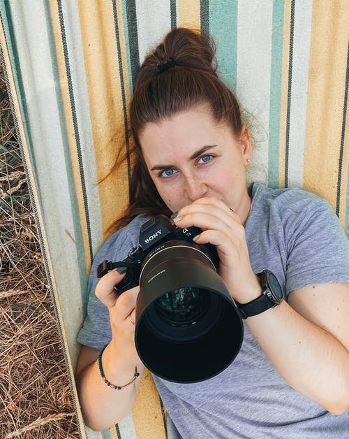 有关3C用品, 单反相机, 垂直拍摄的免费素材图片