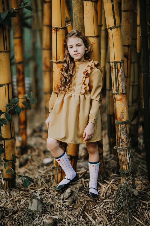 有关卷发, 头发在一边, 女孩的免费素材图片