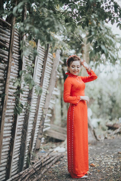 有关传统服装, 垂直拍摄, 奥黛的免费素材图片