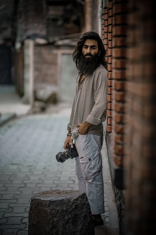 有关人, 垂直拍摄, 摆姿势的免费素材图片