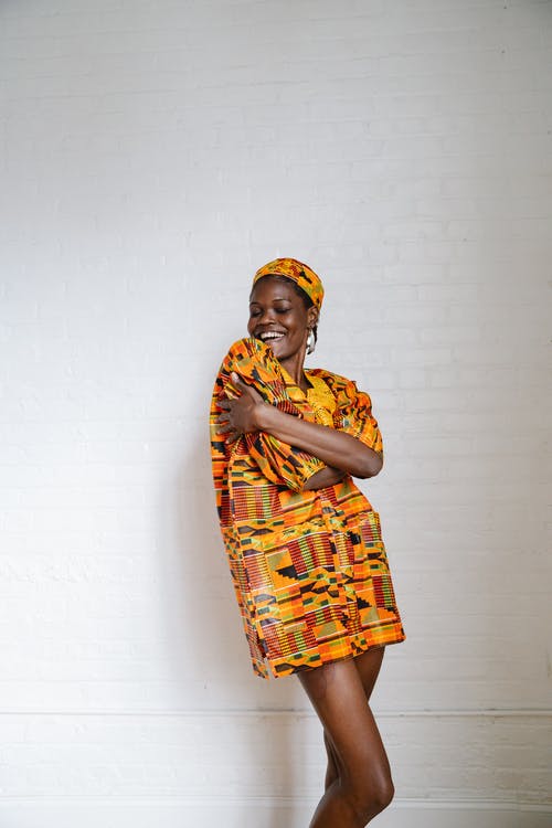 有关传统服装, 垂直拍摄, 女人的免费素材图片