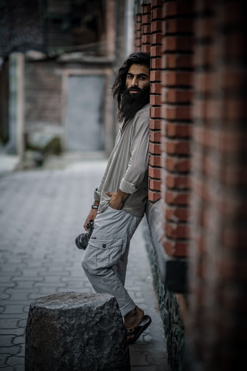 有关人, 倚, 垂直拍摄的免费素材图片