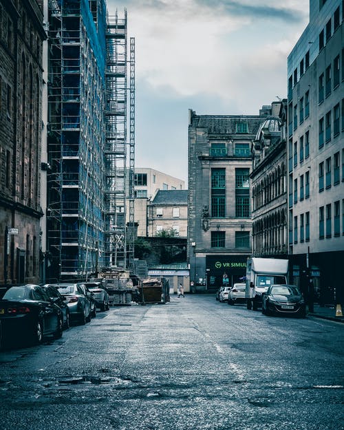 有关停放的汽车, 公寓, 垂直拍摄的免费素材图片