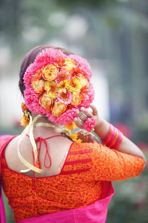 有关发髻, 垂直拍摄, 女人的免费素材图片