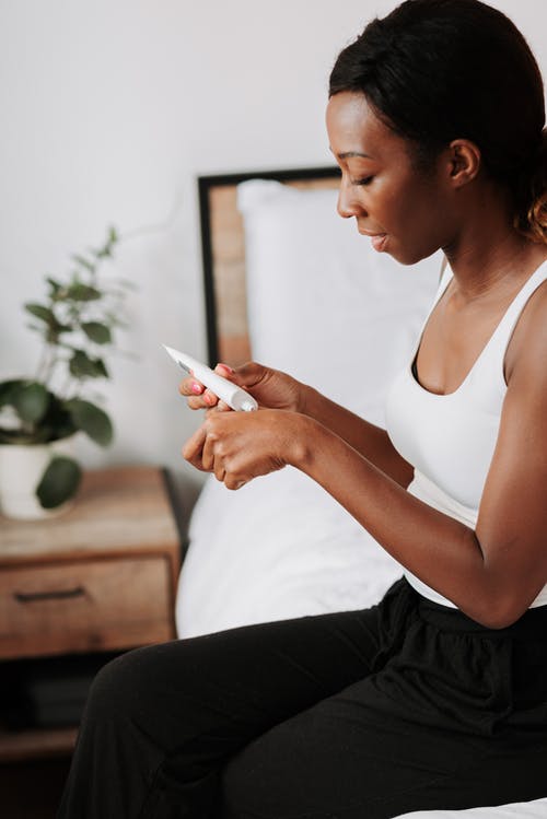 有关乳液, 坐, 垂直拍摄的免费素材图片