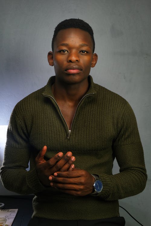 有关双手紧握, 严肃, 垂直拍摄的免费素材图片