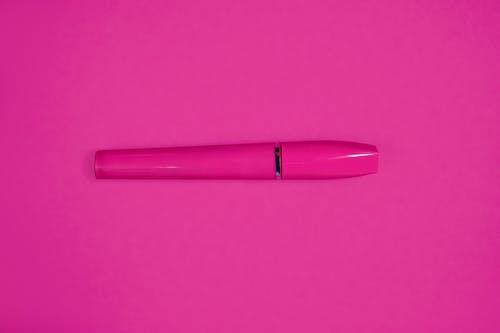 粉红色的容器的特写照片 · 免费素材图片