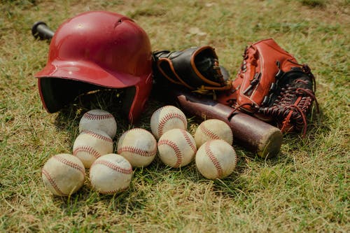 有关棒球, 棒球手套, 棒球棒的免费素材图片