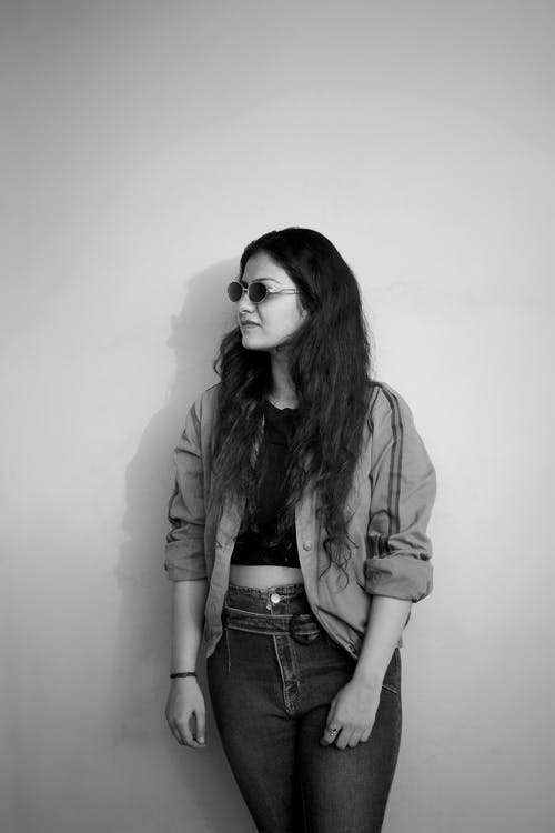 有关垂直拍摄, 墨镜, 夹克的免费素材图片