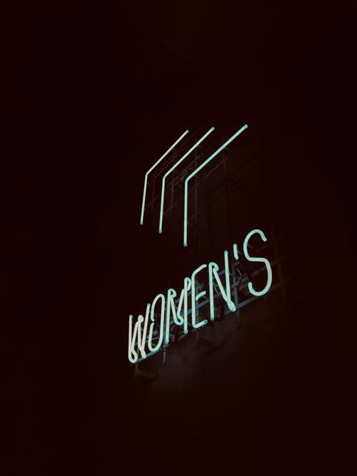 霓虹灯的妇女标牌 · 免费素材图片