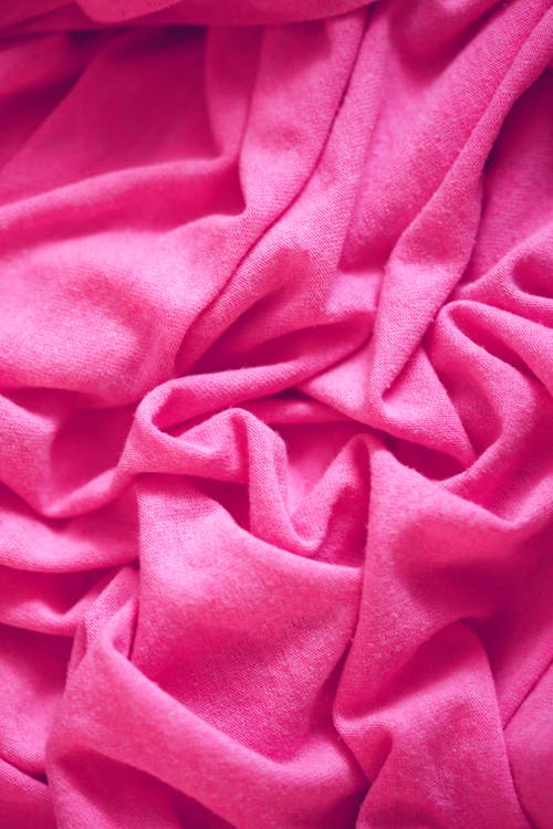 粉色纺织在特写摄影 · 免费素材图片