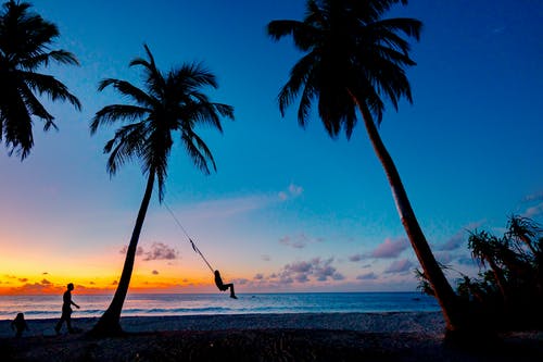 海滩在黎明时的照片 · 免费素材图片