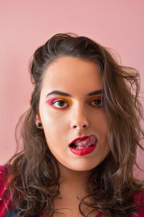 有关伸出舌头, 勾引, 吸引人的免费素材图片