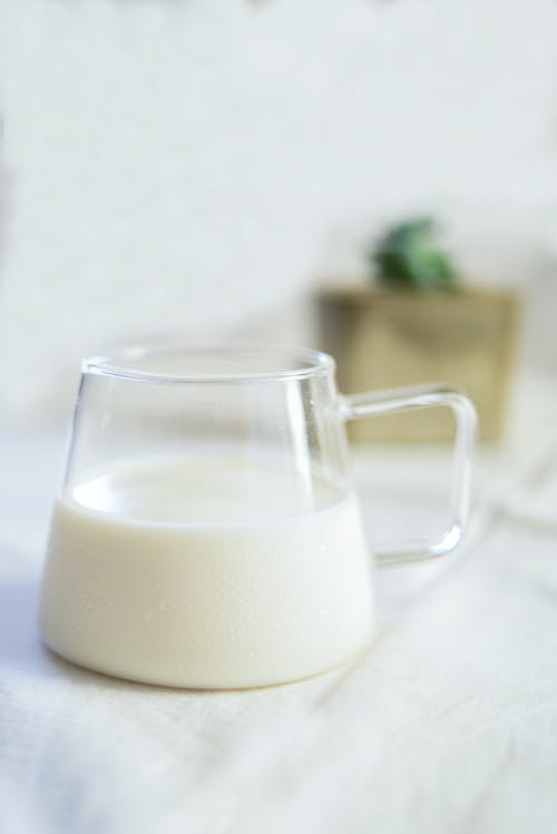 有关喝, 垂直拍摄, 牛奶的免费素材图片