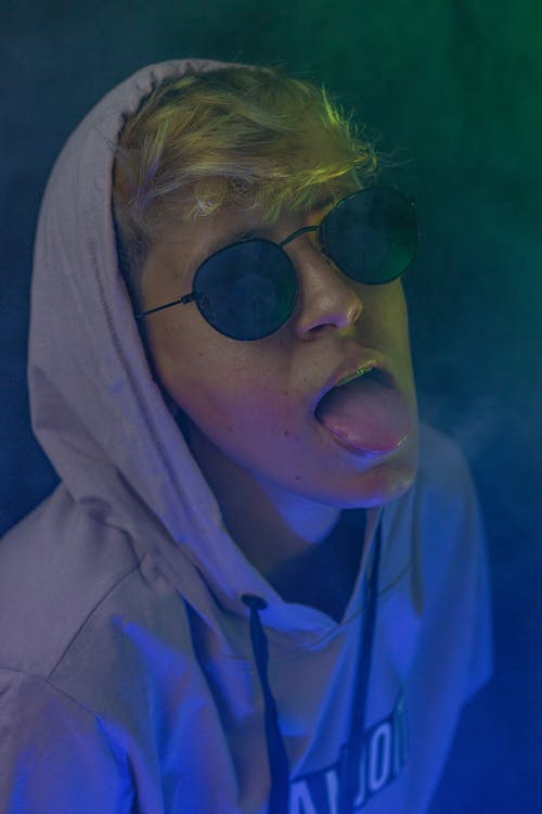 有关伸出舌头, 信心, 个性的免费素材图片