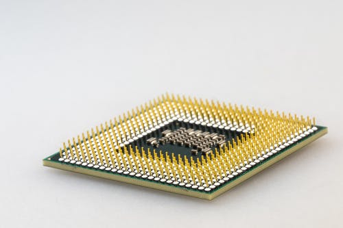 棕色和绿色计算机处理器 · 免费素材图片