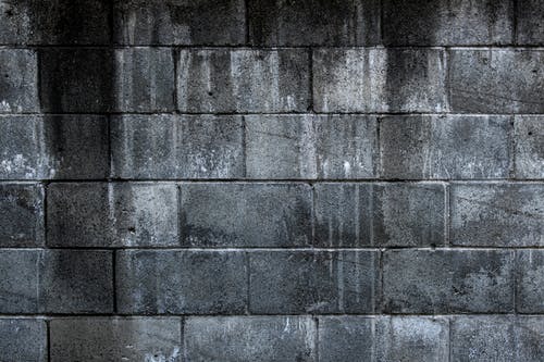 灰色砖墙的特写照片 · 免费素材图片