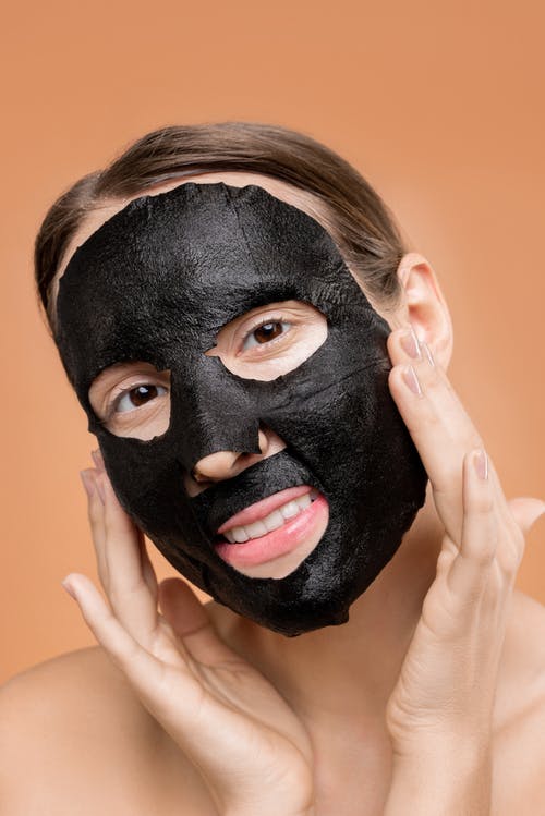 人用黑面具遮住脸 · 免费素材图片