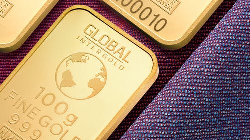 金牌全球intergold 100克优质金条 · 免费素材图片