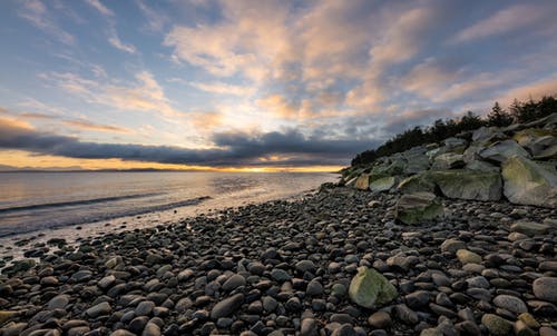 落基海岸日落时的照片 · 免费素材图片