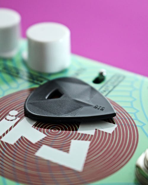 有关吉他拨片, 垂直拍摄, 拨子的免费素材图片