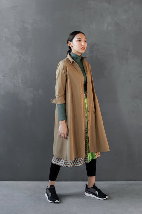 穿绿色高领毛衣的女人的照片 · 免费素材图片