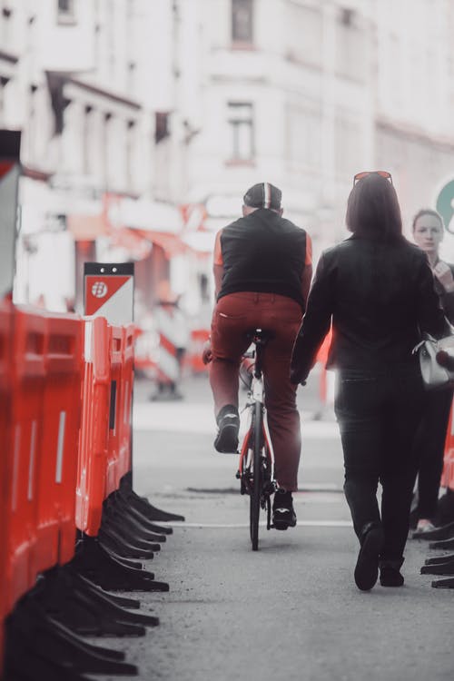 有关人行道, 单车骑士, 垂直拍摄的免费素材图片