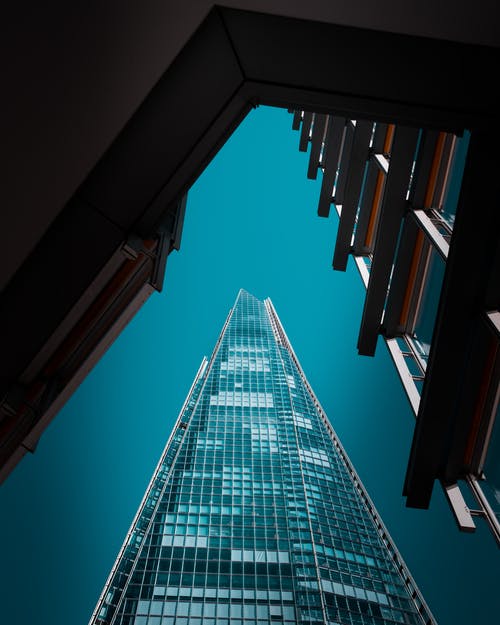 蓝绿色高层建筑的建筑摄影 · 免费素材图片