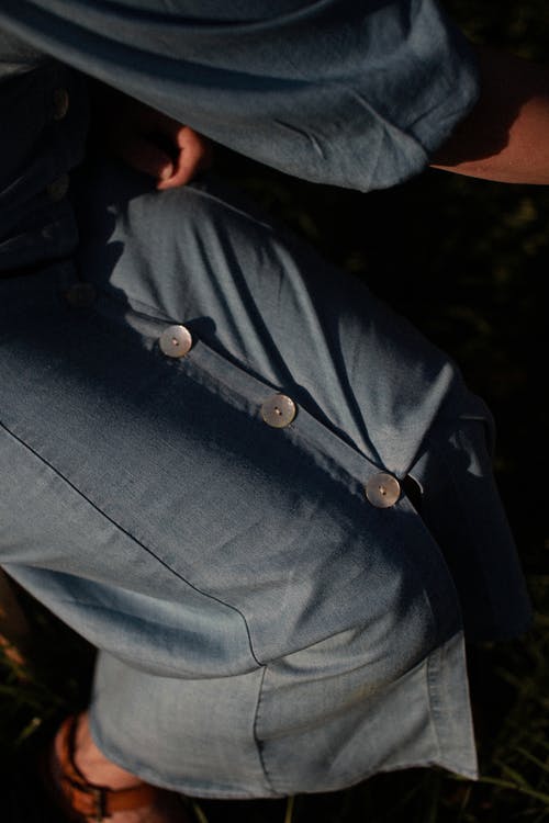 有关人, 坐, 垂直拍摄的免费素材图片