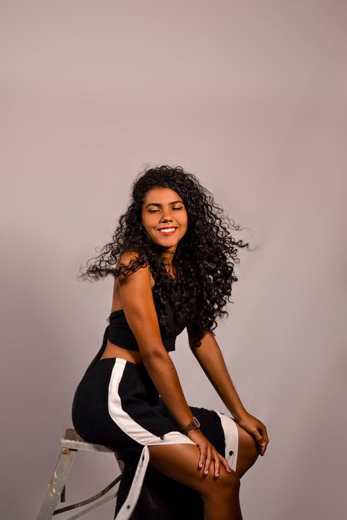 有关人, 坐, 垂直拍摄的免费素材图片