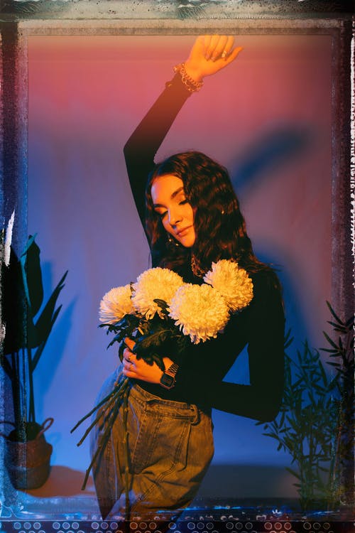 有关举起手臂, 优雅, 内容的免费素材图片