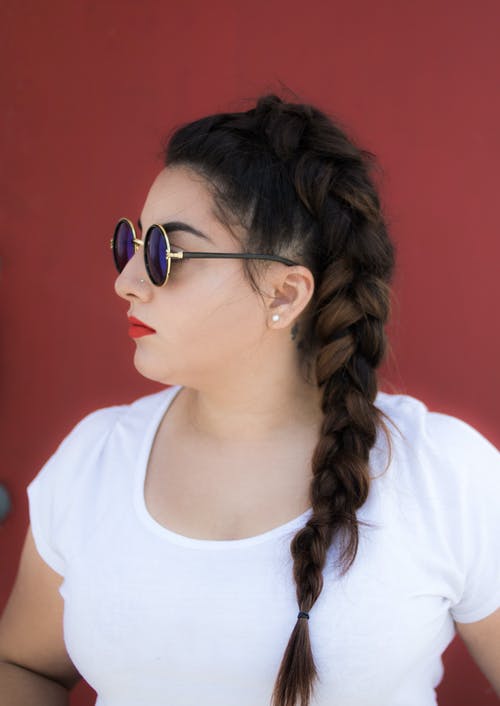 有关垂直拍摄, 墨镜, 女人的免费素材图片