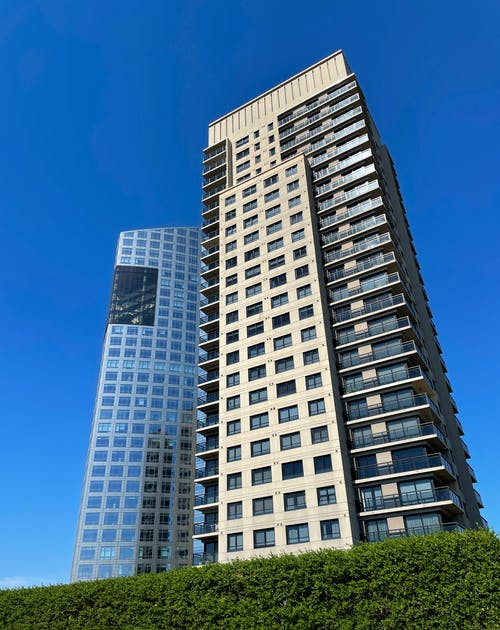 有关住宅楼, 公寓, 垂直拍摄的免费素材图片