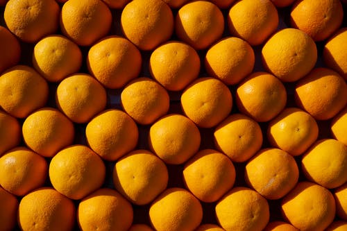 一堆橘子的照片 · 免费素材图片
