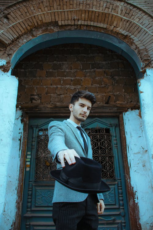 有关人, 垂直拍摄, 帽子的免费素材图片