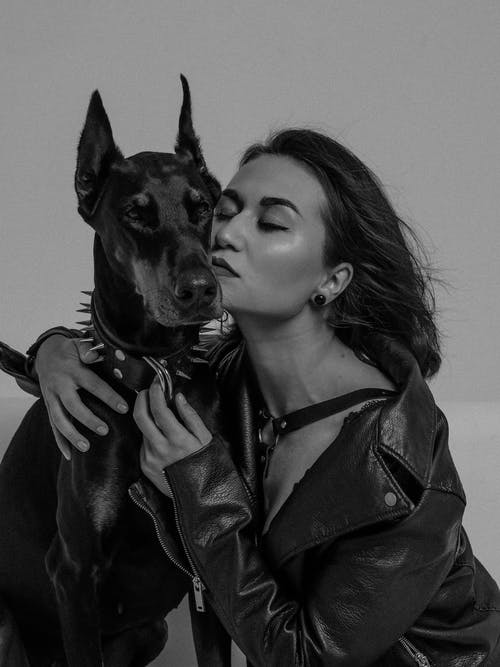 有关女人, 宠物, 工作室拍摄的免费素材图片