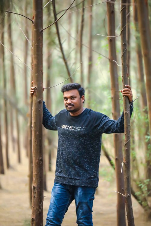 有关人, 垂直拍摄, 握住的免费素材图片