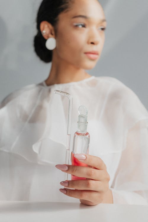 有关修手指甲, 化学, 垂直拍摄的免费素材图片