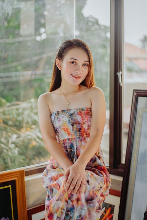 有关人, 坐, 垂直拍摄的免费素材图片