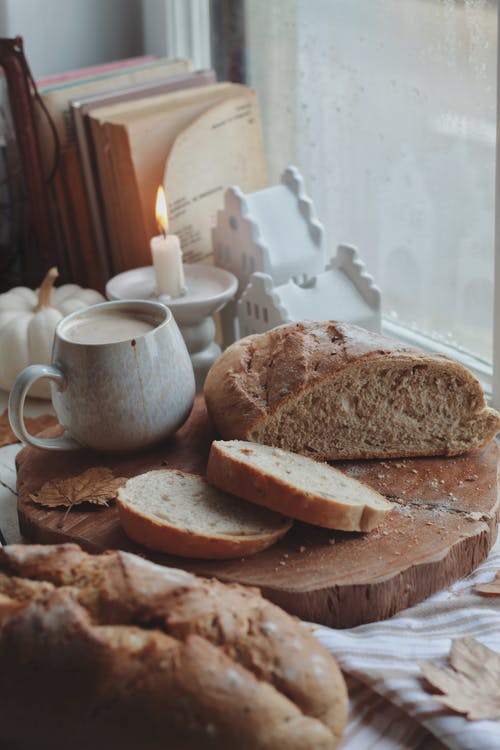 有关一杯咖啡, 切面包, 厨房的窗户的免费素材图片