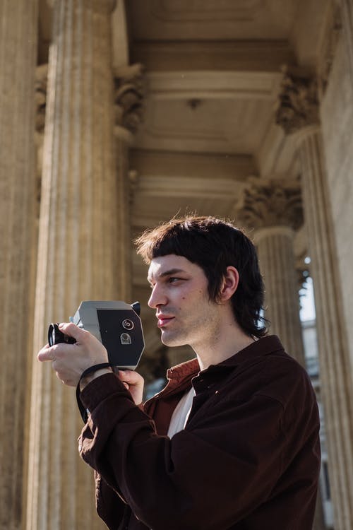 有关人, 低角度视图, 垂直拍摄的免费素材图片