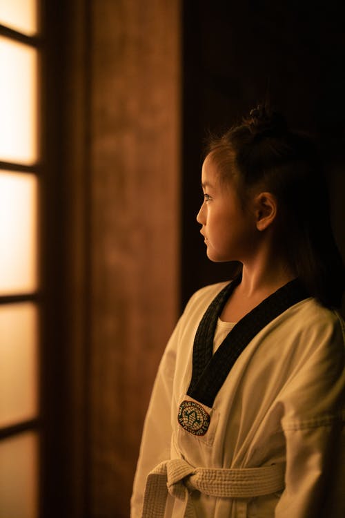 有关兒童, 制服, 垂直拍摄的免费素材图片