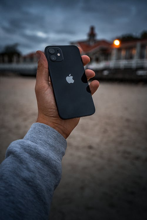 有关品牌, 垂直拍摄, 握住的免费素材图片