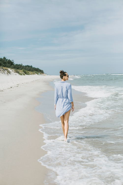 有关发髻, 墨鏡, 女人的免费素材图片