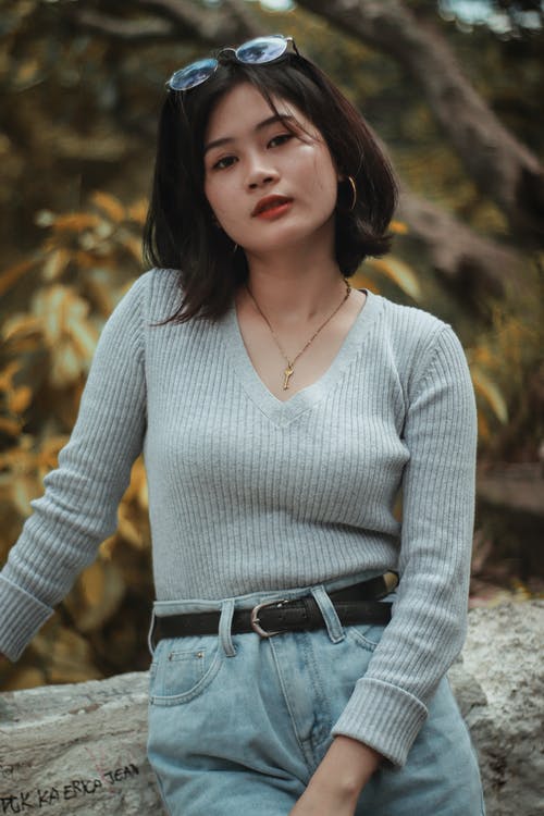 有关可愛, 咖啡色頭髮的女人, 垂直拍摄的免费素材图片