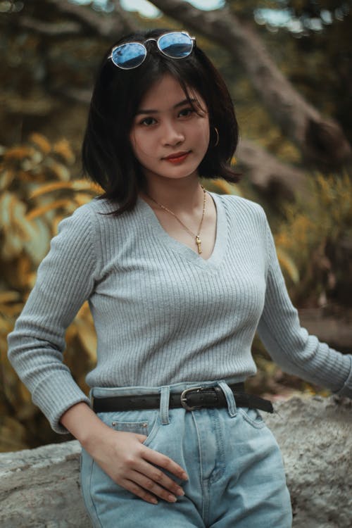 有关垂直拍摄, 墨鏡, 女孩的免费素材图片