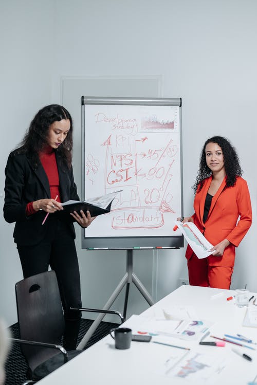 有关商界女性, 商量, 垂直拍摄的免费素材图片