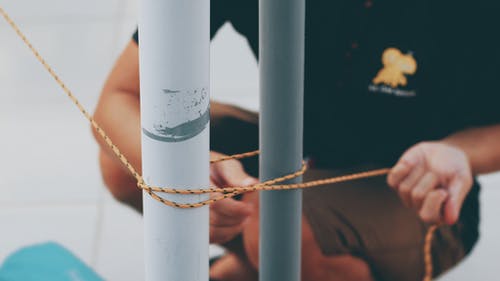 有关手, 打領帶, 特写的免费素材图片