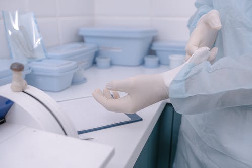 有关医务工作人员, 室內, 手套的免费素材图片